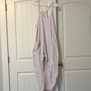 Light Pink free people movement jumpsuit with Pockets